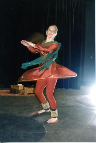 Woman dancing at an unknown performance