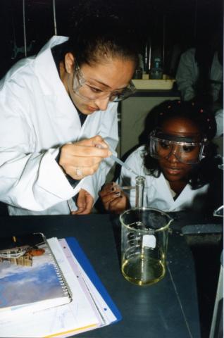 People performing chemistry experiments