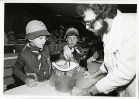 Boy Scouts performing science experiment