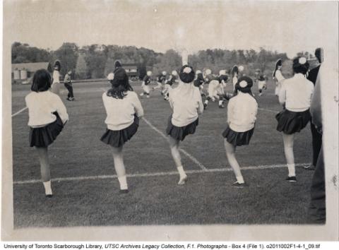 Women's Cheerleading Team at a Football Game