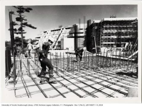 Construction workers on the Humanities Wing