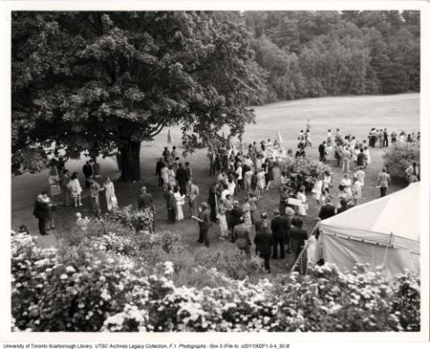 Aerial view of a party in the Valley near the Miller Lash house