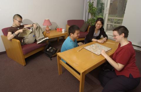 Students Read and Play Scrabble in Residence Room, Promotional Image