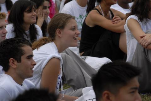 Two Students Sitting on Ground with Group, React to Orientation Event, Orientation, 2006