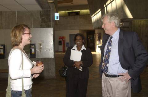 David Miller Speaks with Student, Unidentified Woman Standing Nearby, Research Symposium in Support of the Mayors Panel on Community Safety, the Meeting Place