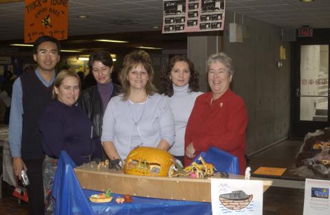 Library Staff Pose with First Prize Winner, The Ark by The ARK, Pumpkin Carving Contest, the Meeting Place