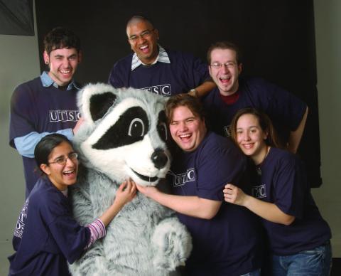 Group of Students with Rex the Raccoon Mascot