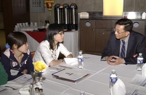 Kwong-loi Shun Speaks with Students at Table, Green Path Program Reception, HW305 Event Space