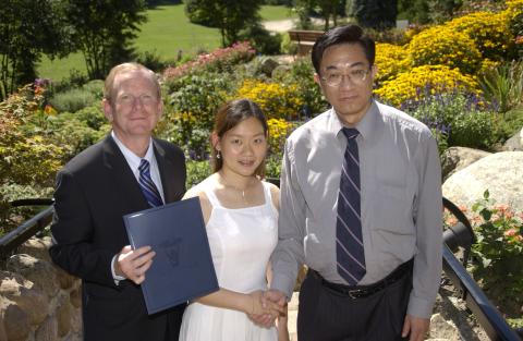 Don MacMillan and Kwong-loi Shun with Student, International Student Event, Miller Lash House