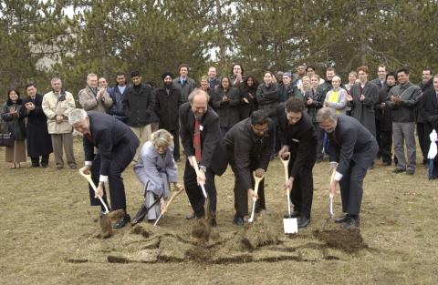 Dignitaries With Shovels doing Groundbreaking, Groundbreaking Event for Student Centre, Outdoors on Site