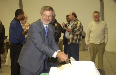 Paul Thompson Cutting Cake, Opening of UTSC Pavillion (Temporary Lecture Space)