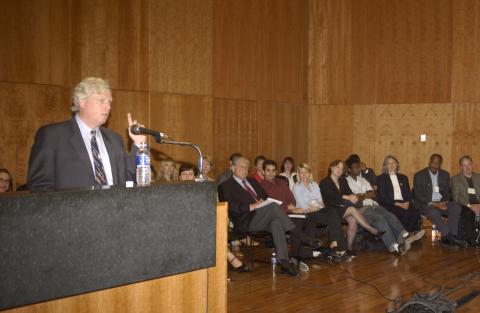 David Miller Speaks, Dignitaries and Panelists in Background, Research Symposium in Support of the Mayors Panel on Community Safety, ARC Lecture Theatre, Academic Resource Centre (ARC)