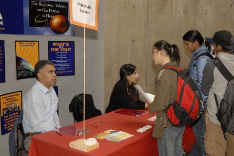 Students Speak with Presenters at Inroads Toronto Table, Expand Your Horizons: Volunteer & Internship Fair, the Meeting Place