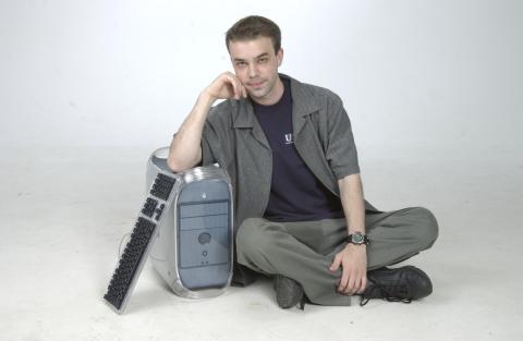 Peter Miljanovic, Student, with Computer Tower, New Media Studies, Promotional Image