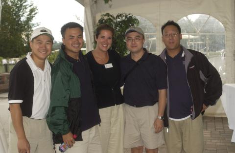 Group of Players and Participants Pose for Photograph by Event Tent, Management Alumni Association Golf Tournament, 2002, Deer Creek Golf Club