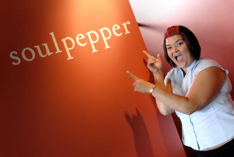 Co-op Student Points at Corporate Signage, Arts Management Co-op Placement, Soulpepper Theatre Company