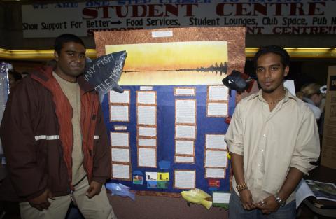 Students with Poster, Poster Session for Unidentified Conference (Biology, Environmental Science, Physical Sciences), the Meeting Place