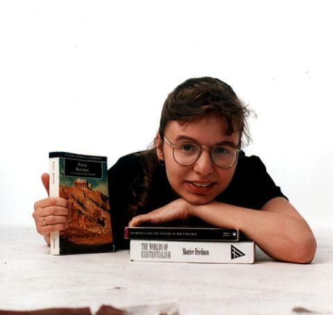 Student Poses with Books, Promotional Image, Philosophy