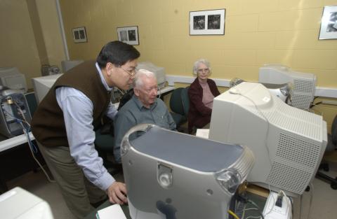 Leslie Chan and two other People Working with Computers, New Media Studies Program, Promotional Image