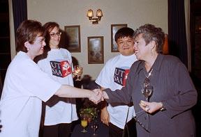 UT SAA Members (Wearing Branded T-Shirts) Shake Hands with Roberta Jamieson, Watts Lecturer for 2000, Event at Miller Lash House