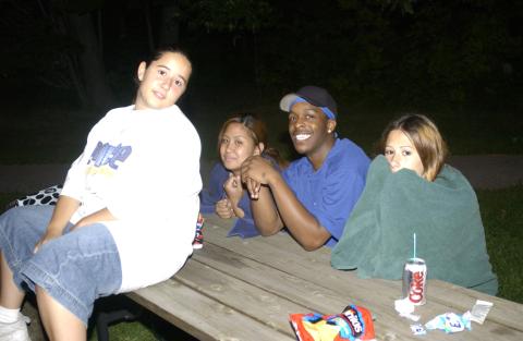 Students Sitting on Picnic Table, Summerfest, 2003