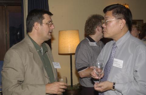 Leslie Chan Speaks with Event Guests, Unidentified Launch Event, Miller Lash House