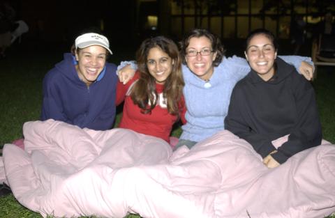 Student Group Sitting on Lawn with Duvet, Summerfest, 2003