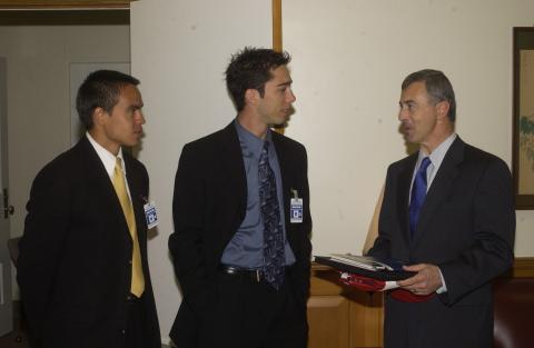 Unidentified Person and Dan Bandurka with Paul Cellucci. UTSC Students Present Memorial Book Dedicated to Victims of the 9/11 Terrorist Attacks
