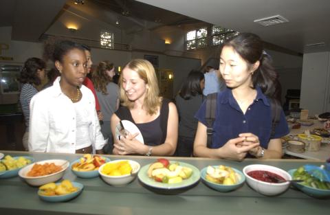 Students at Buffet Table, International Development Studies Potluck, Residence Centre