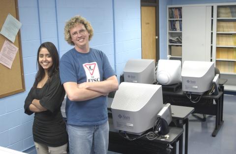 Steve Joordens with Unidentified Person in Computer Lab, Promotional Image