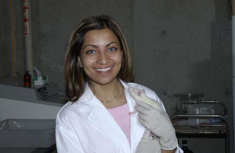 Student in Biology Lab With Rat, Promotional Image