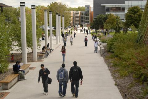 Students Walk along Pathway between Academic Resource Centre (ARC) and Management Building (MW)