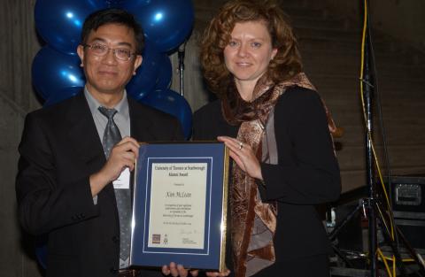 Kwong-loi Shun and Kim McLean Pose with Alumni Award, UTSC Fortieth Anniversary Event, the Meeting Place
