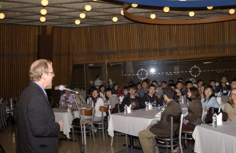Don MacMillan Speaking to Students at Tables, Green Path Program Reception, HW305 Event Space