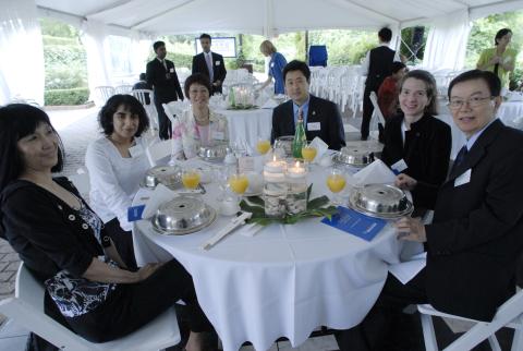 Event Attendees at Table, Reception Celebrating $4 Million Gift by Tung Lin Kok Yuen, Hong Kong, to Buddhist Studies at University of Toronto Scarborough, Tent, Miller Lash House Grounds.