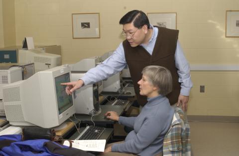 Leslie Chan with Senior at Computer