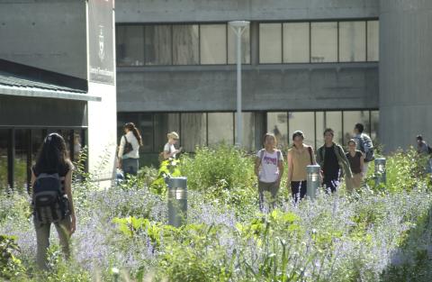 Students walk along Landscaped Path beside Arts and Administration Building (AA)