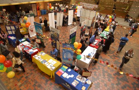 View of Students and Tables taken from Gallery Level, Graduate & Professional Schools Fair, the Meeting Place