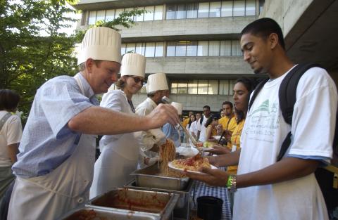 Students Being Served at Spaghetti Buffet, Orientation, H-Wing Patio