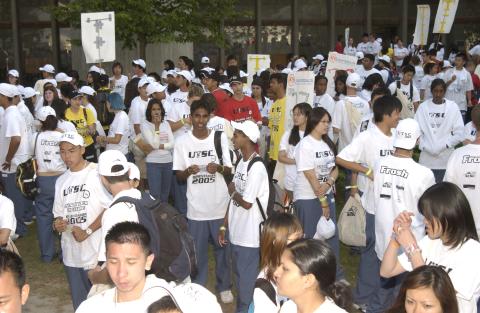 Group of Students with Shinarama Signs (Parade?), Outdoors, Orientation, 2005