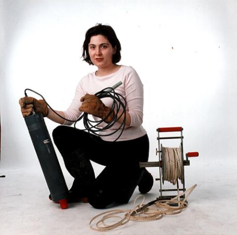 Student Poses with Environmental Science Equipment, Promotional Studio Image