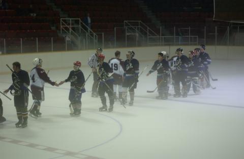 Teams Shaking Hands on Ice, Hockey Game, Homecoming Event (Varsity Arena, St. George Campus?)