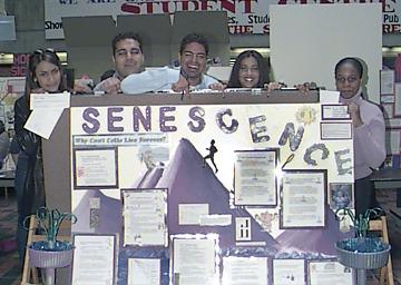 Students with Poster, Student Academic Event, the Meeting Place