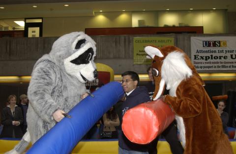 Rex the Racoon Mascot Jousts with Fusion Radio Fox Mascot, Spirit Event, the Meeting Place
