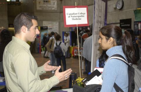 Student Speaking with Canadian College of Naturopathic Medicine Presenter, Professional and Graduate School Fair, the Meeting Place