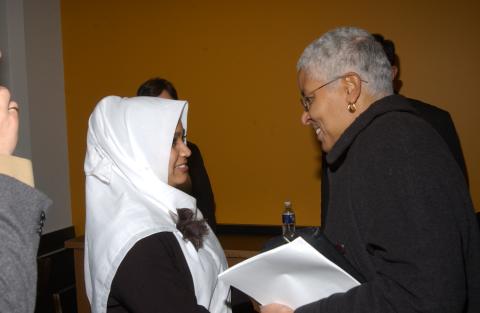 Mary Anne Chambers Speaking with Event Guest, Promotional Image