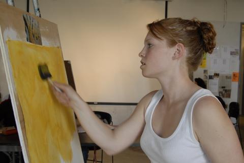 Student Paints at Easel in Studio