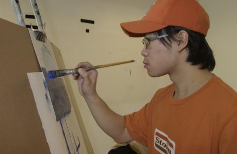 Student Painting in Art Studio, Studio Art Class