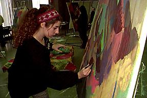 Student Paints in Art Studio
