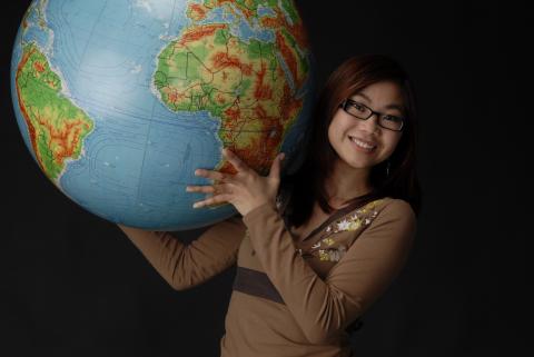 Student, Holding (Inflatable?) Globe, Promotional Image